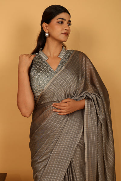 Gray color tussar silk saree with silver strips