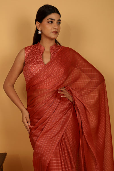 Orange color tussar silk saree with strips