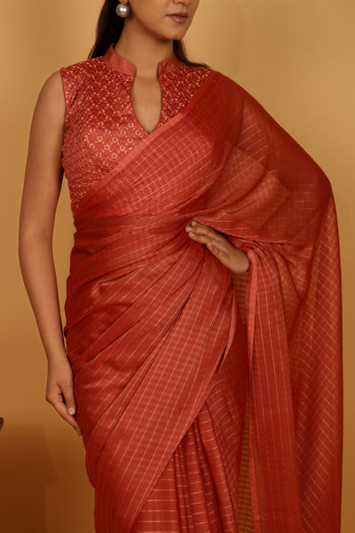 Orange color tussar silk saree with strips